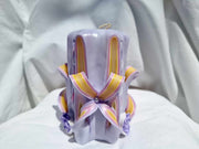 Handmade floral purple carved candle