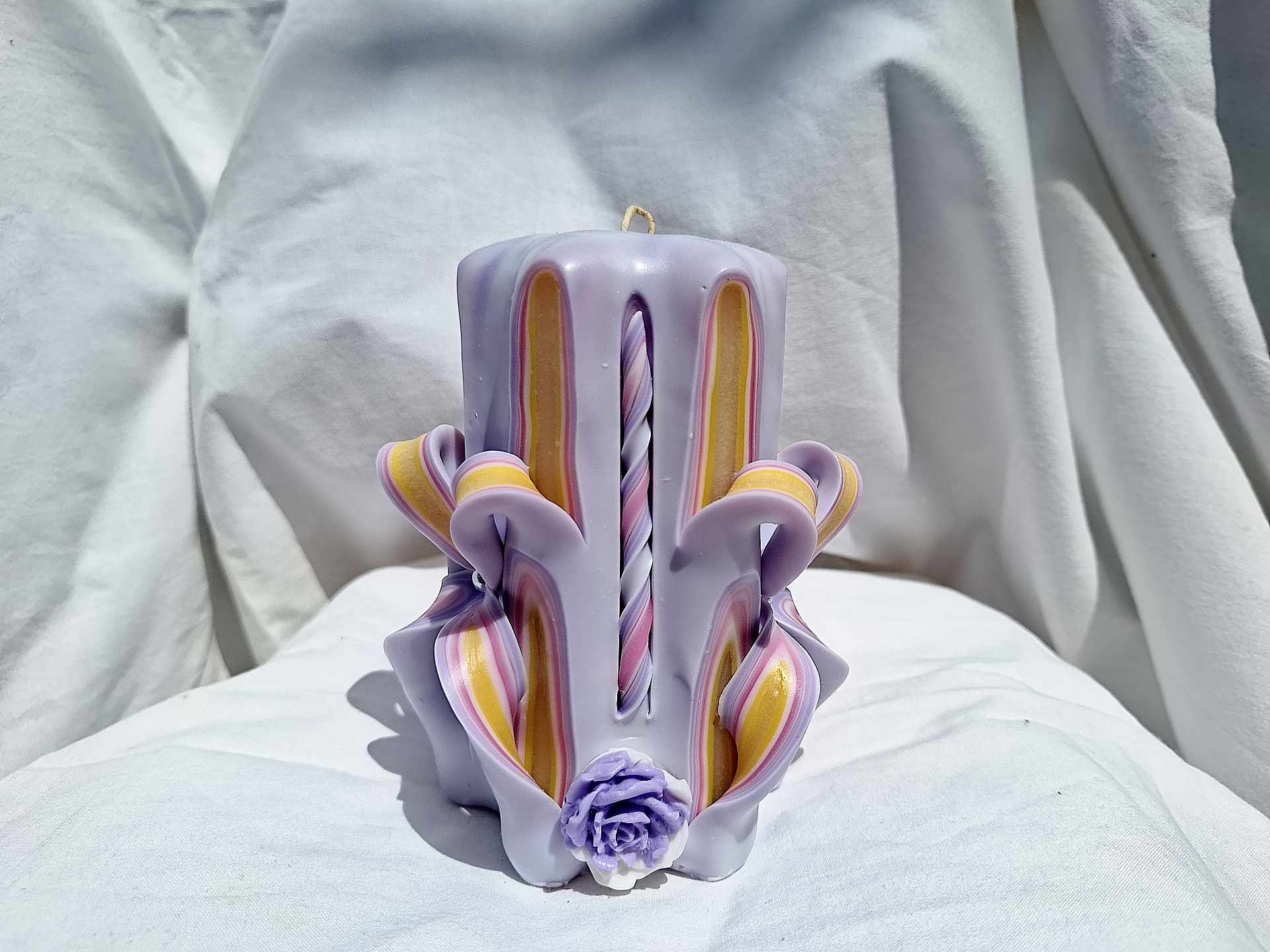 Handmade floral purple carved candle