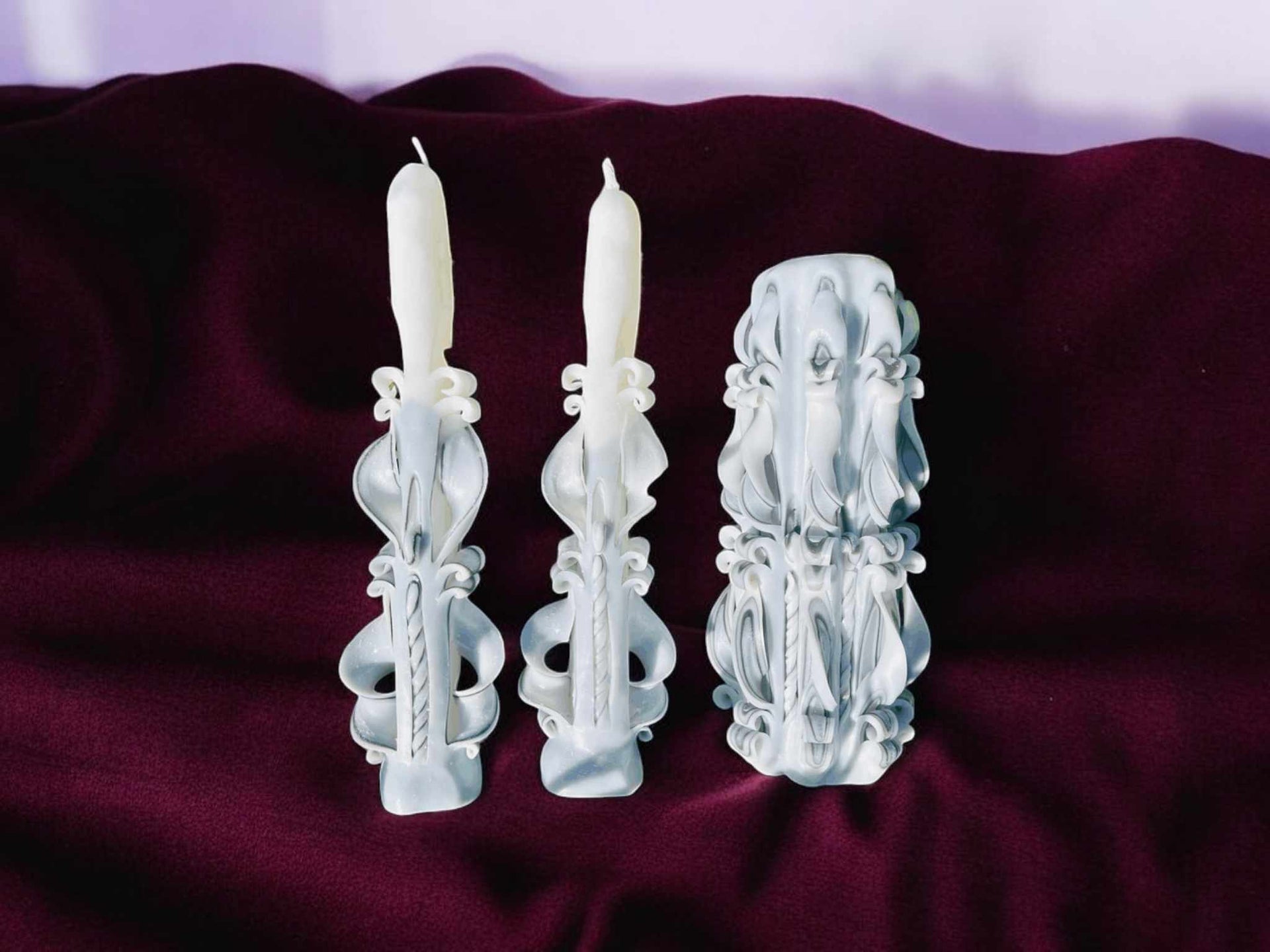 Handmade scented carved candle with roses design