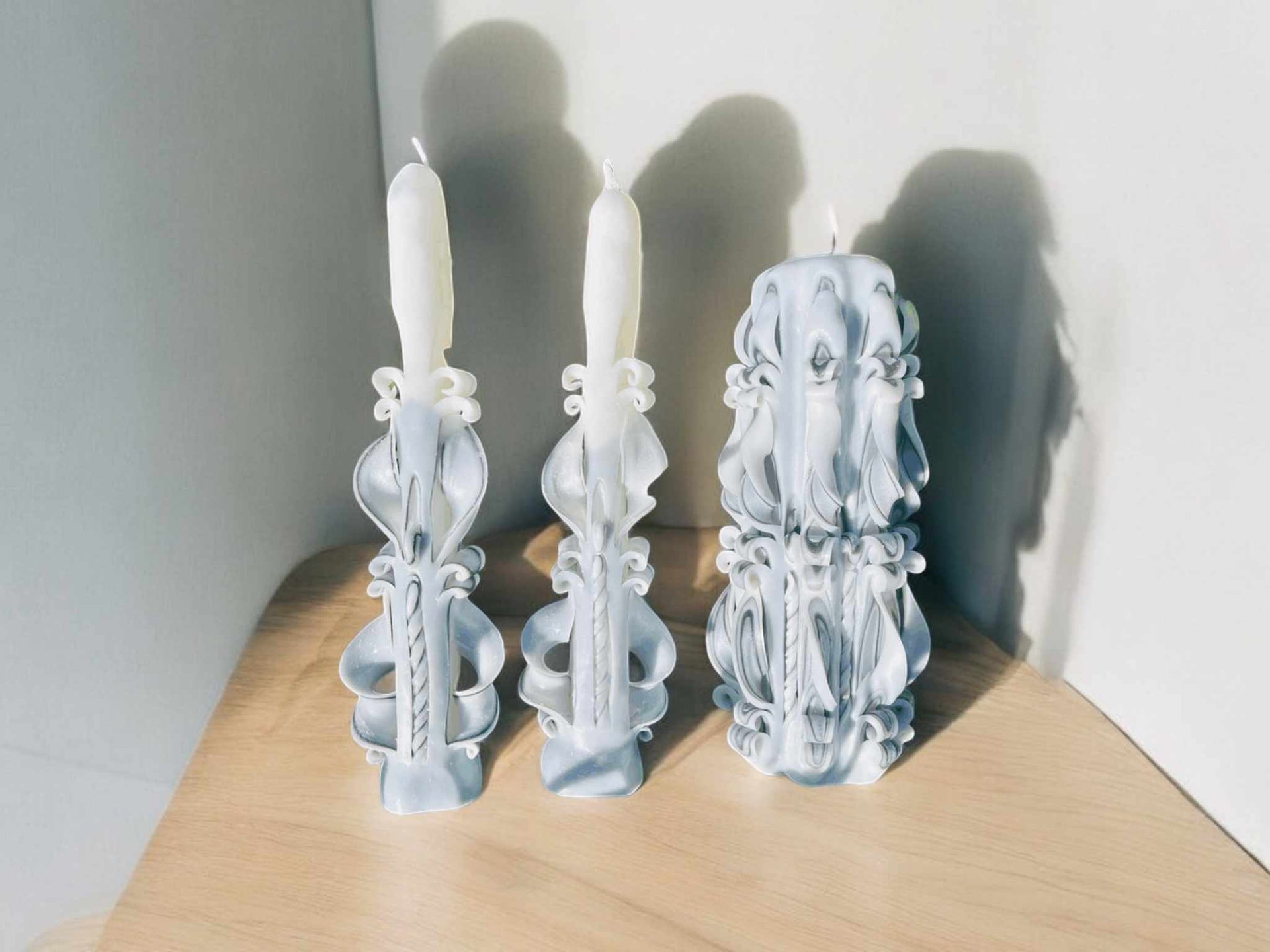 Handmade scented carved candle with roses design