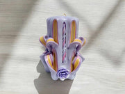 Handmade floral purple carved candle