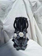 Black and white carved rose candle floral design