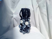 Black and white carved rose candle floral design