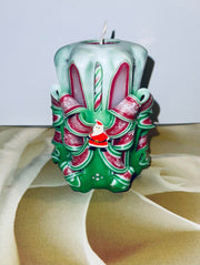 Carved Christmas candle centerpiece