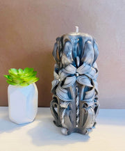 Hand-carved Bow candle in black and white