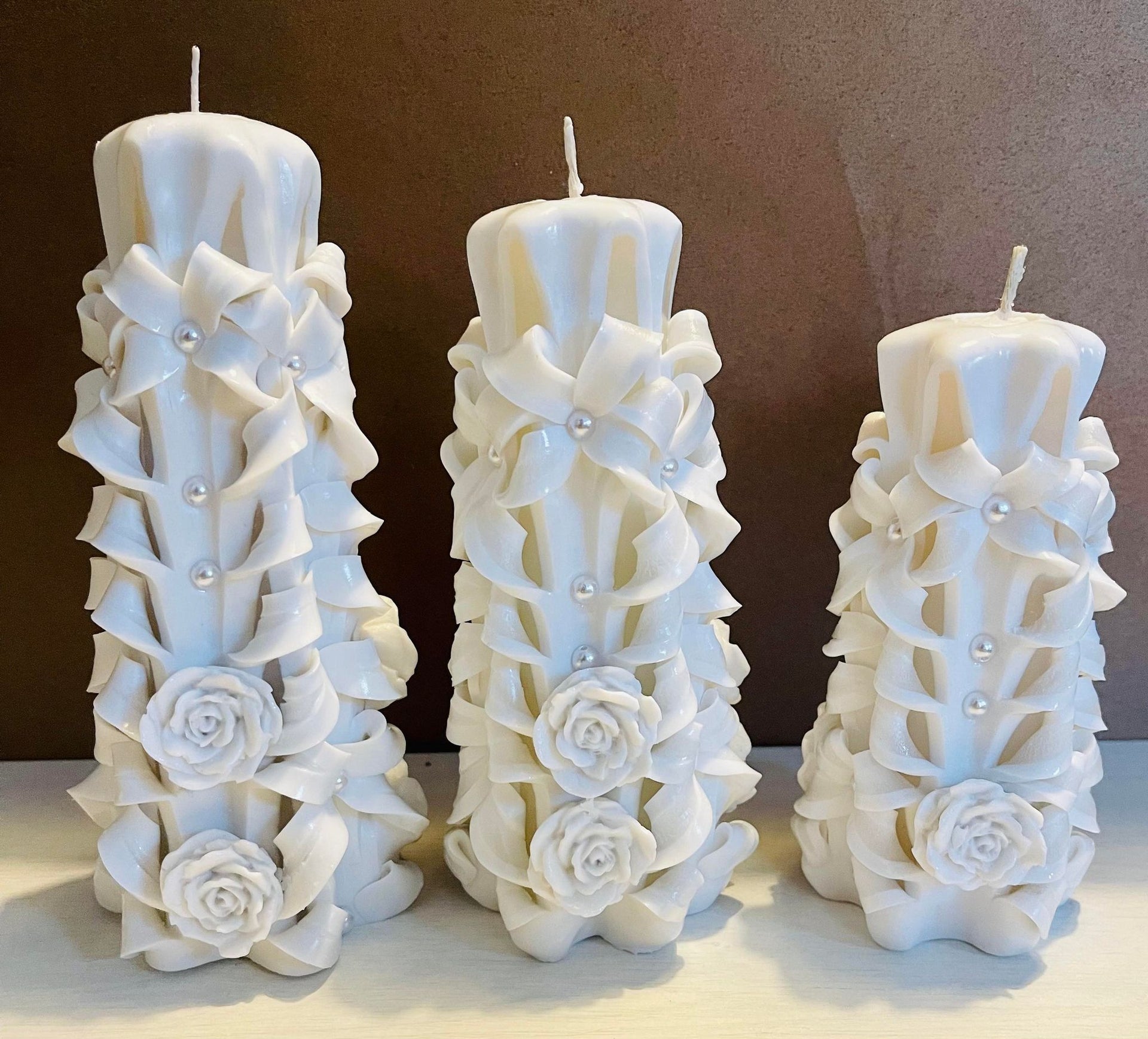 Handmade carved flowery design candles set of 2